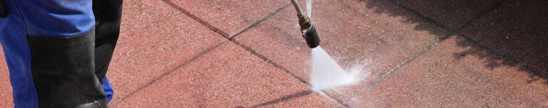 Pressure Cleaning nozzle cleaning tiles.